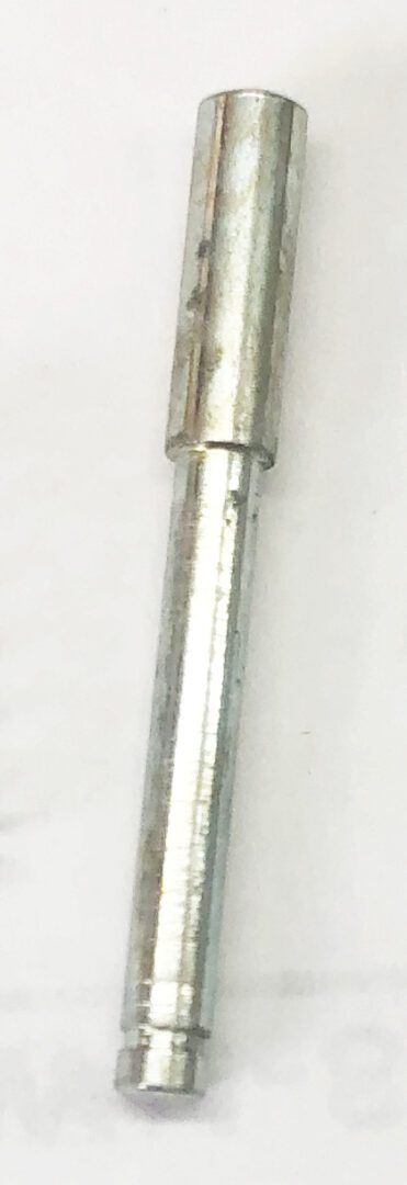A close up of the end of a metal object.