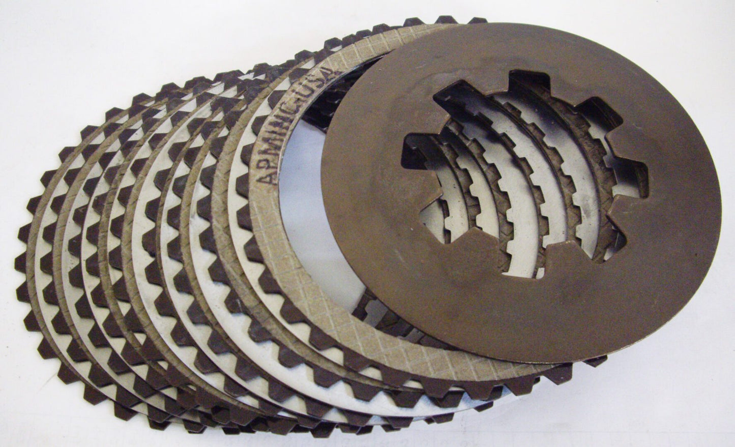 A group of different sized metal discs.