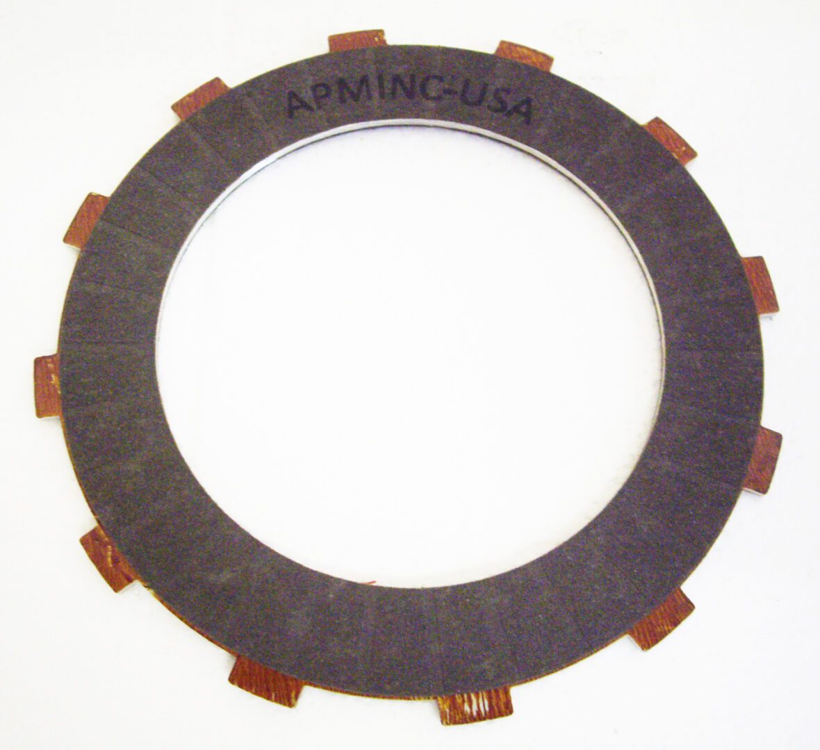 A picture of the front end of an engine clutch plate.
