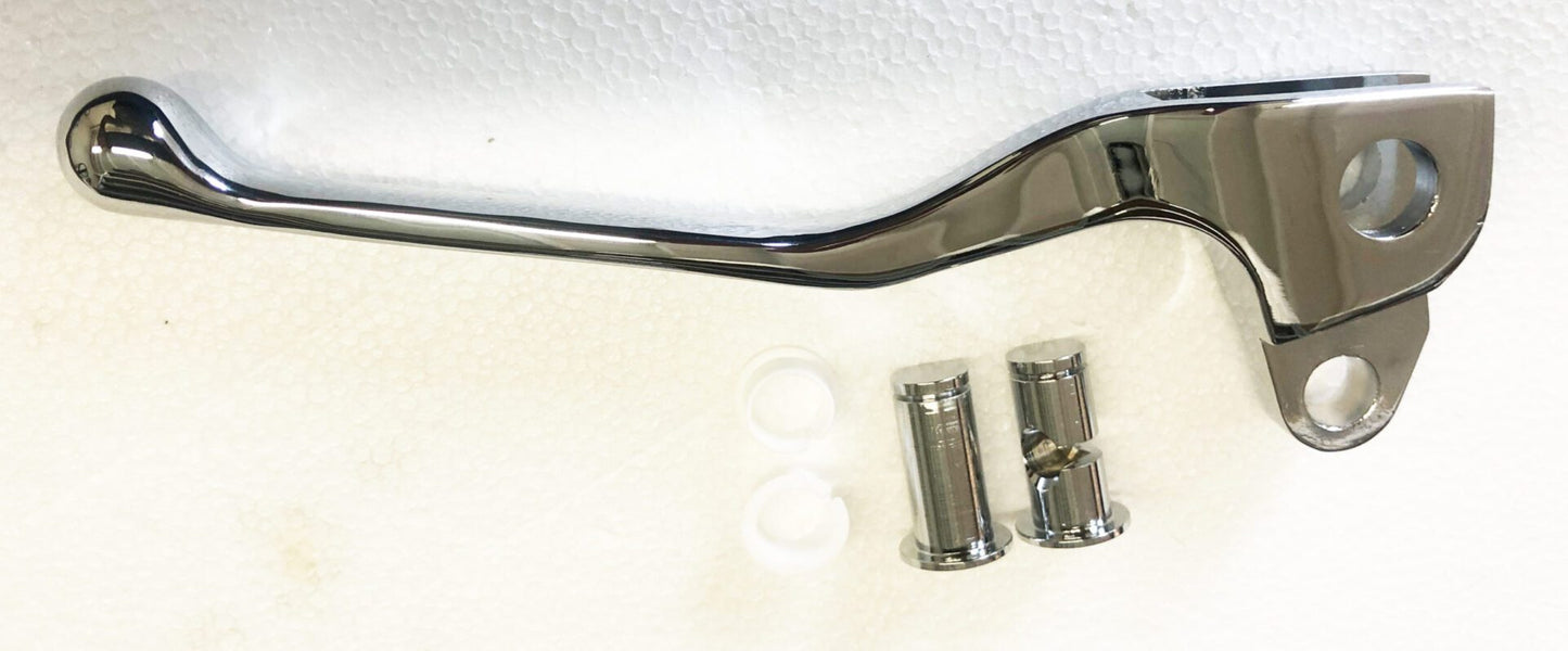 A pair of metal pipes and two white plastic caps.