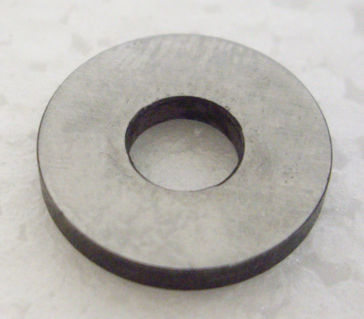 A washer is shown on the floor.