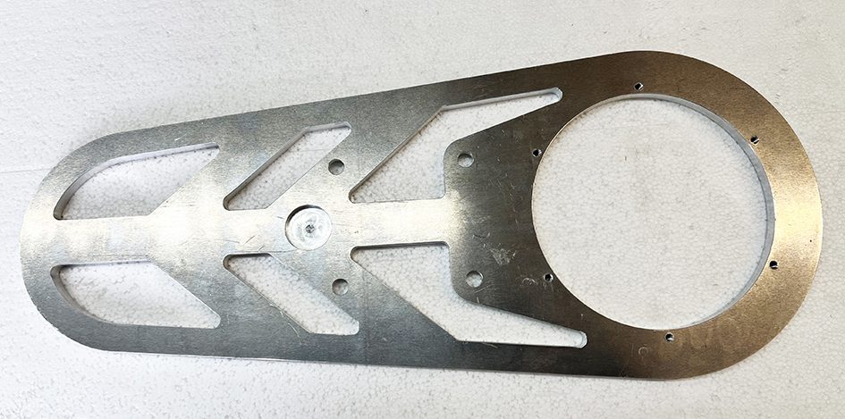 A metal piece of art that is made to look like it has been cut out.