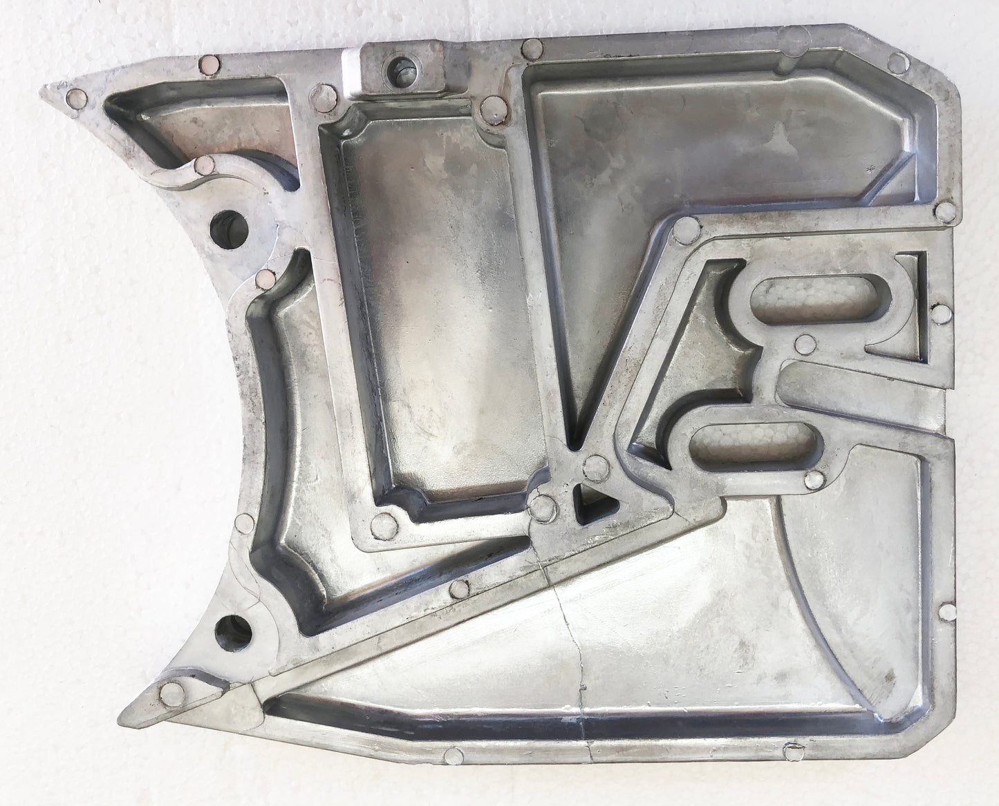 A metal piece of art that is made to look like it has been cut out.