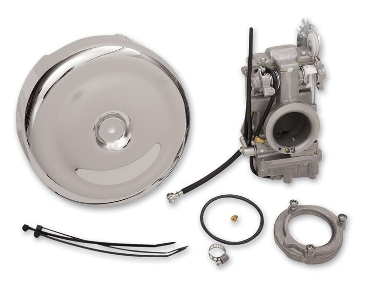 A carburetor and the parts needed to repair it.