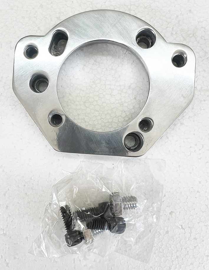 A silver metal piece with some nuts and bolts