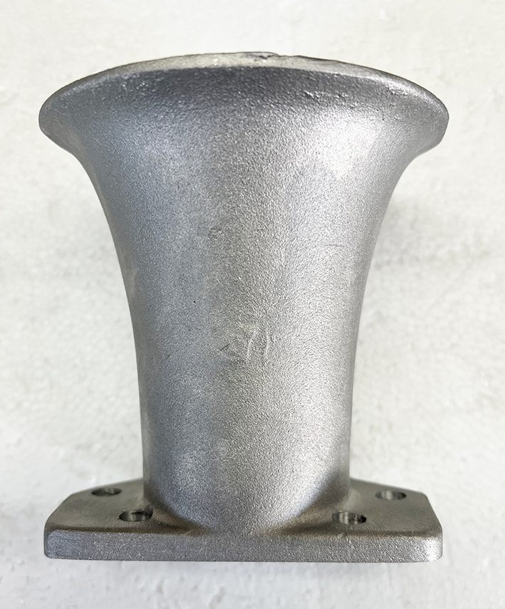 A close up of the top of a metal object.