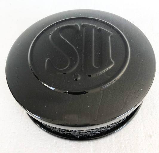 A black lid with the letter s on it.