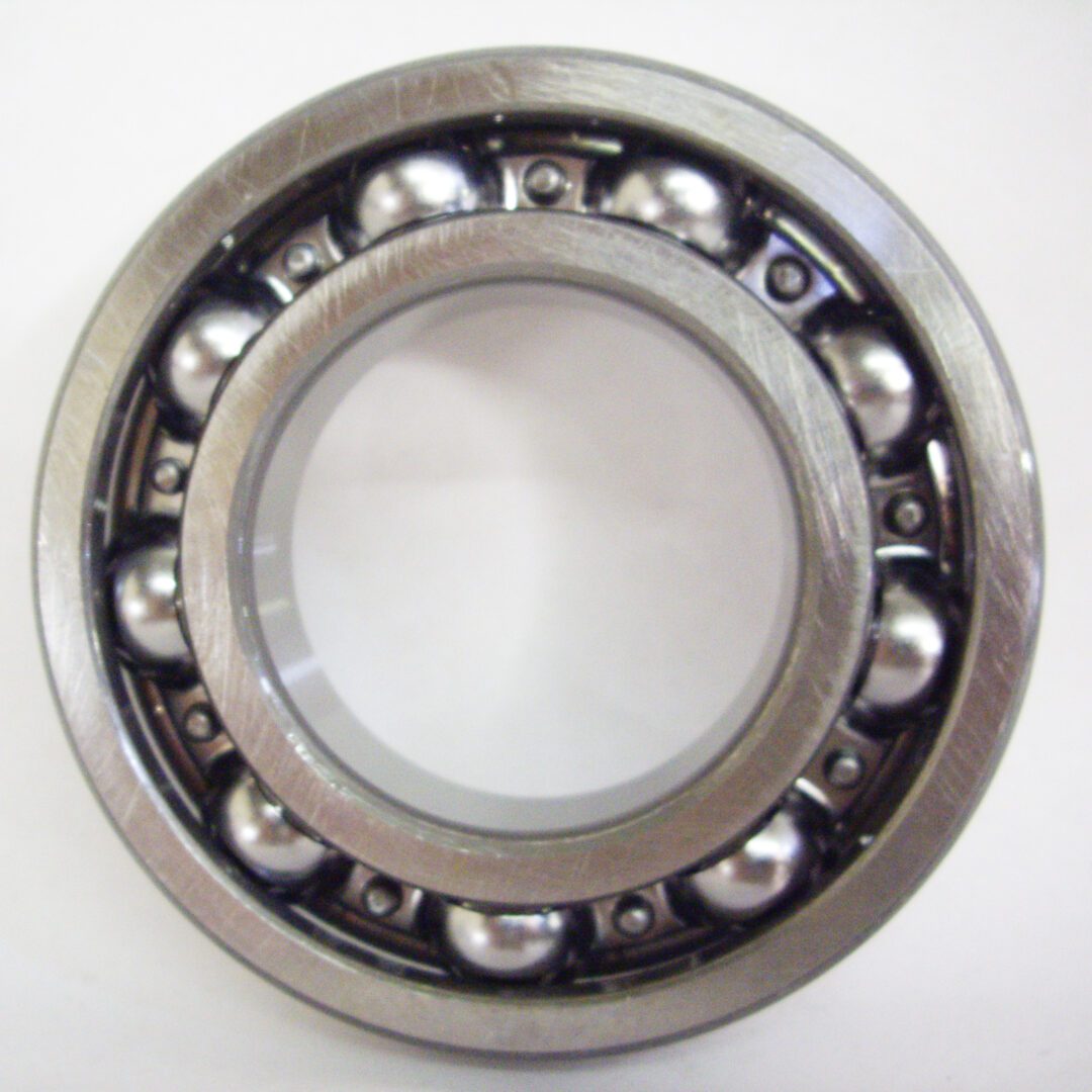 A ball bearing with a metal rim on top of it.