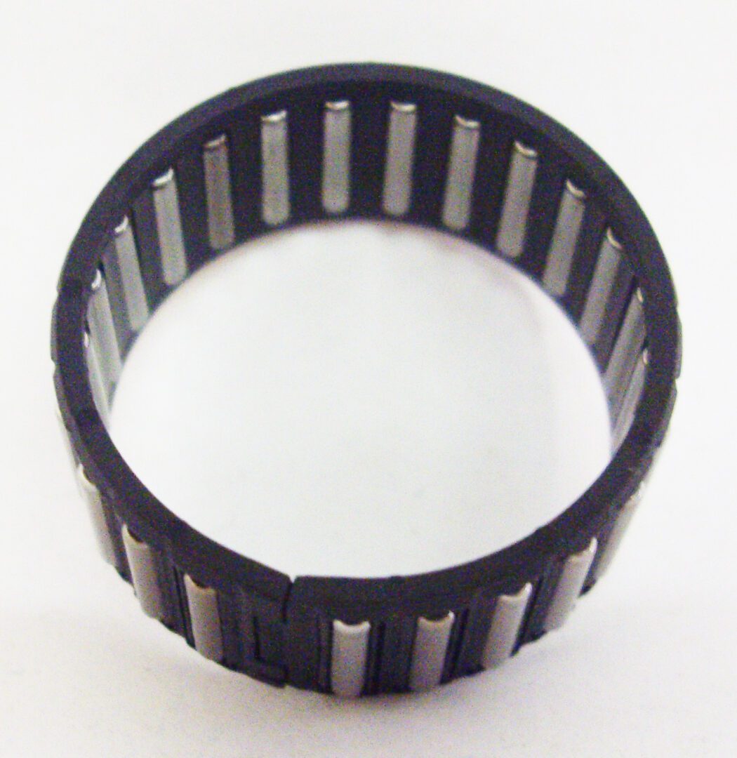A black and silver ring with some white lines