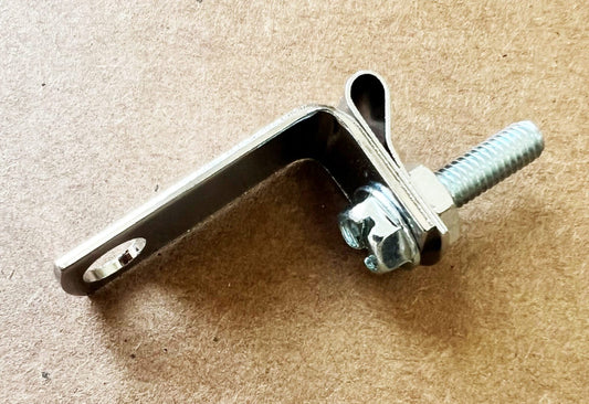 A metal clamp with a nut and bolt attached to it.