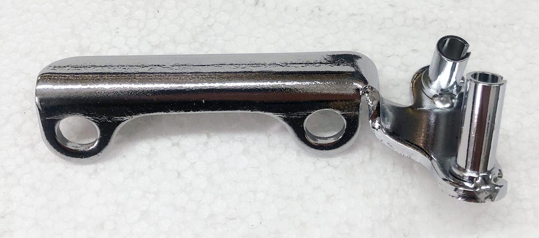 A close up of the handle on a gun