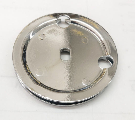 A metal plate with holes for the top of it.