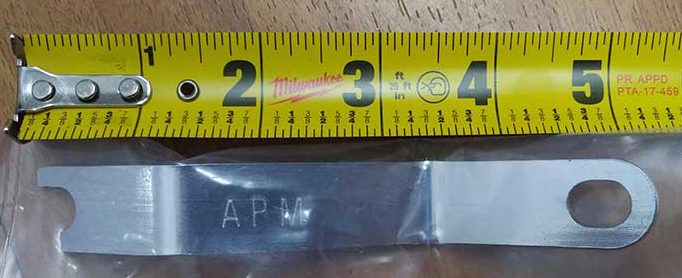 A measuring tape and a piece of plastic