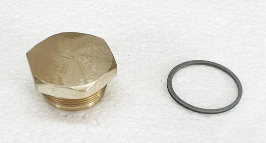A close up of the cap and o ring on a piece of paper