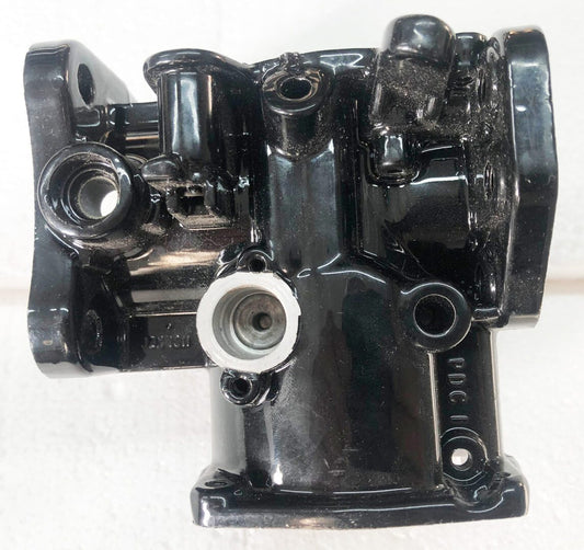 A black and white photo of an engine block.