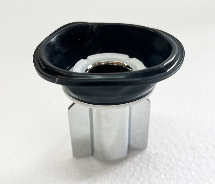 A black and silver object sitting on top of a table.