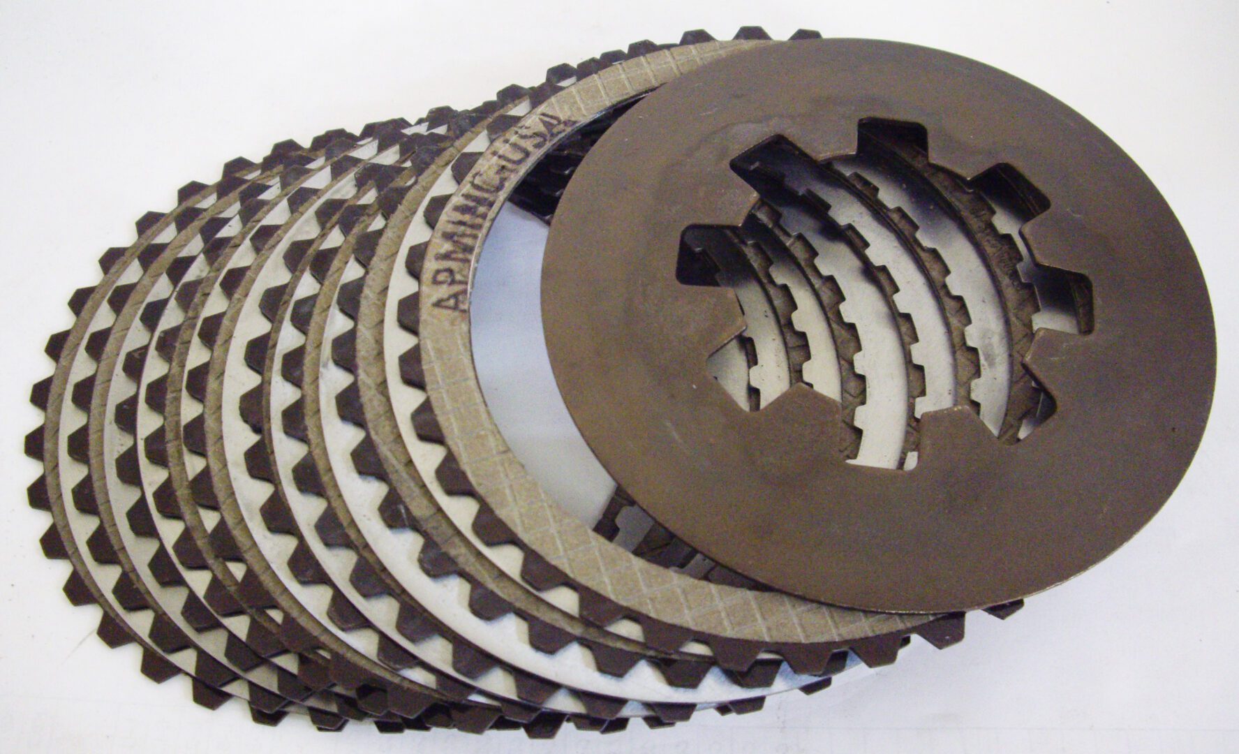 A group of different sized metal discs.