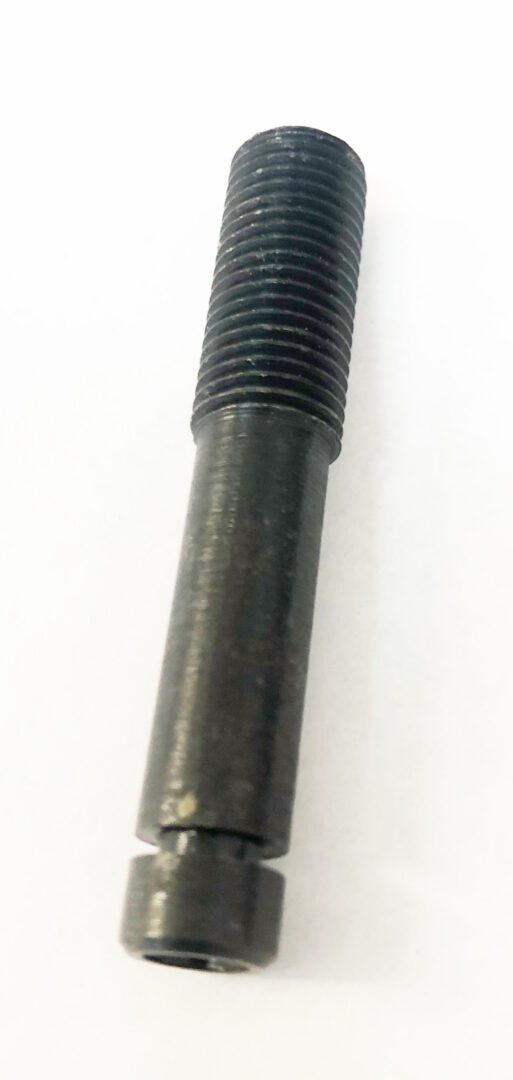 A close up of the end of an old screw