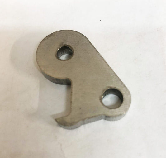 A metal piece of material that is bent to make it look like a wrench.