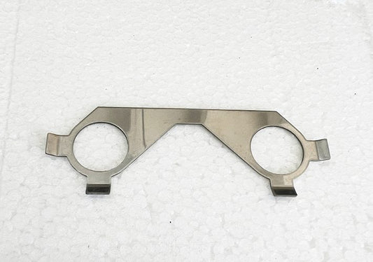 A metal piece of art that is shaped like glasses.