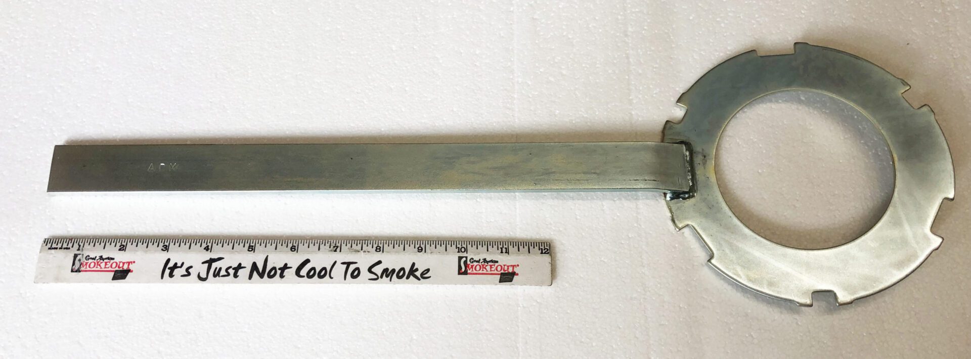 A ruler and some type of tool to smoke