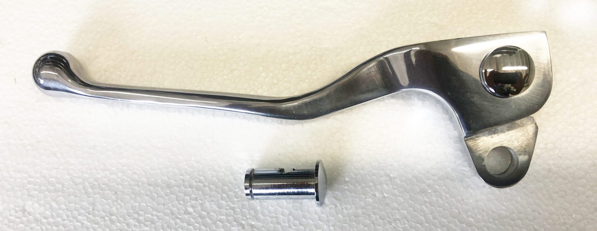A metal handle and a piece of wire