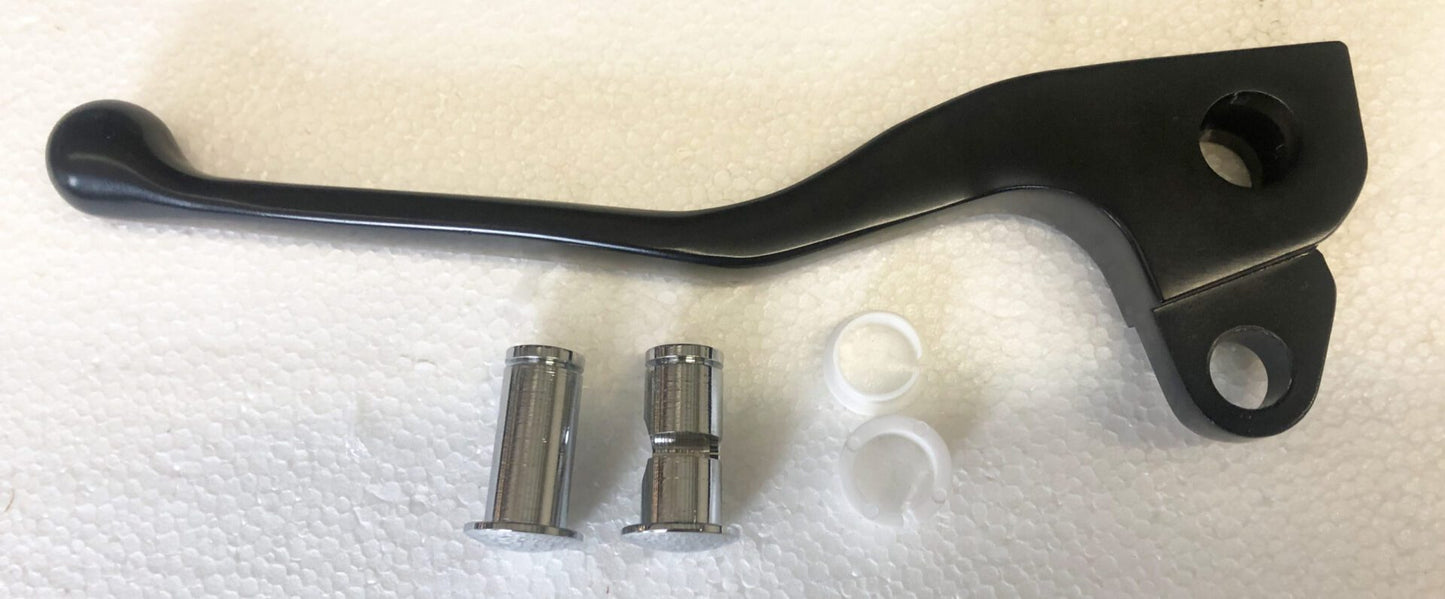 A pair of metal parts and a black handle.