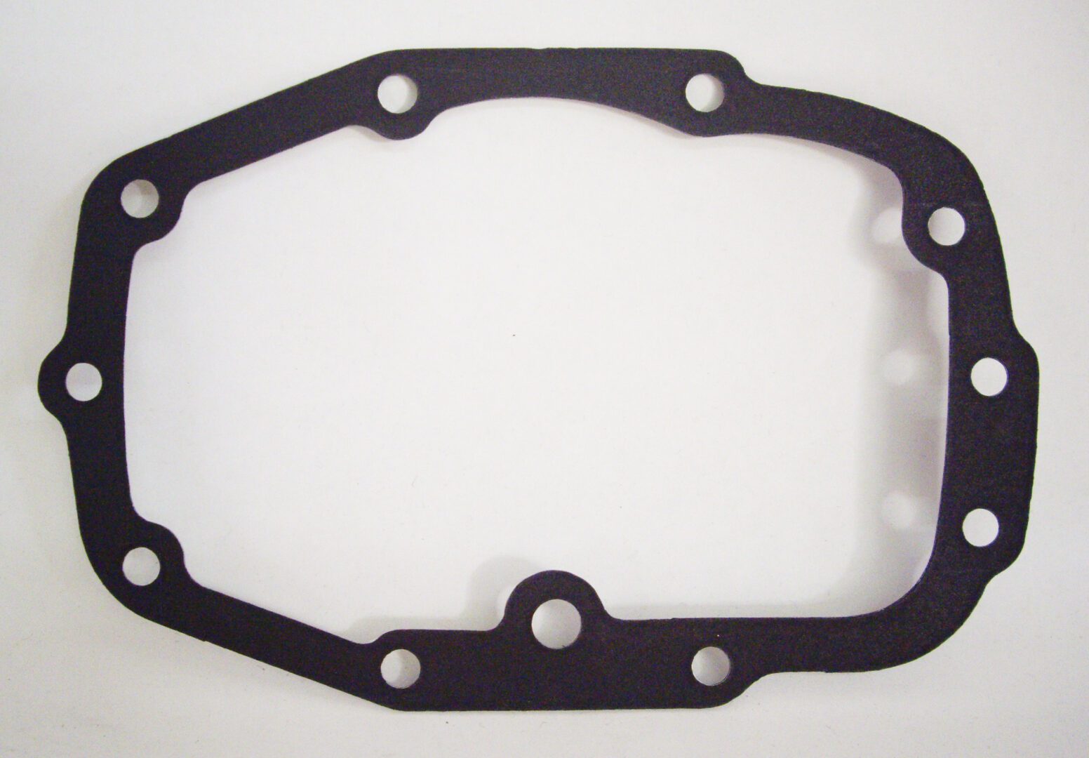 A black gasket is shown on the bottom of a white background.