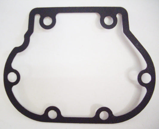 A black gasket that is on the side of a white table.
