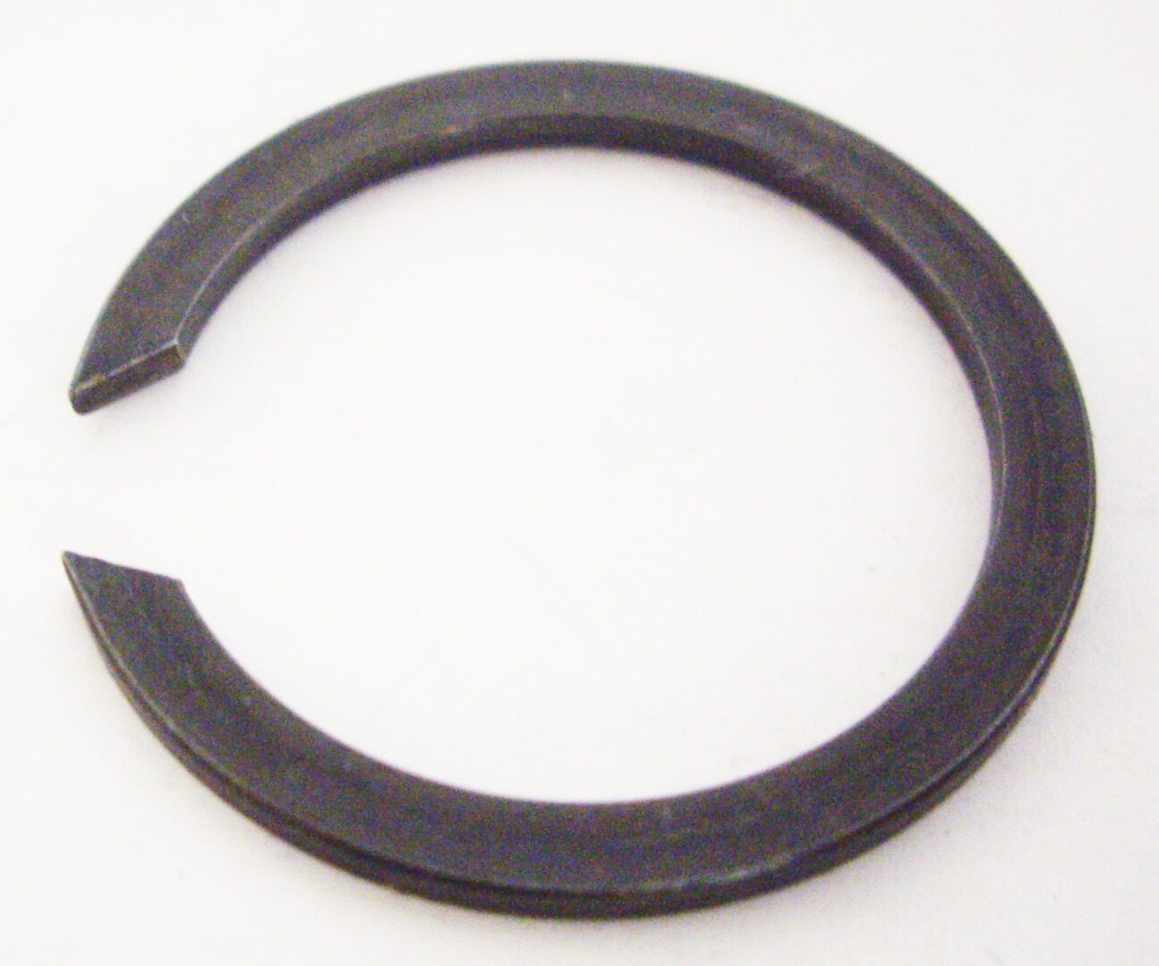 A black ring with some white background