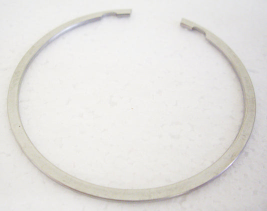 A white background with a metal ring.