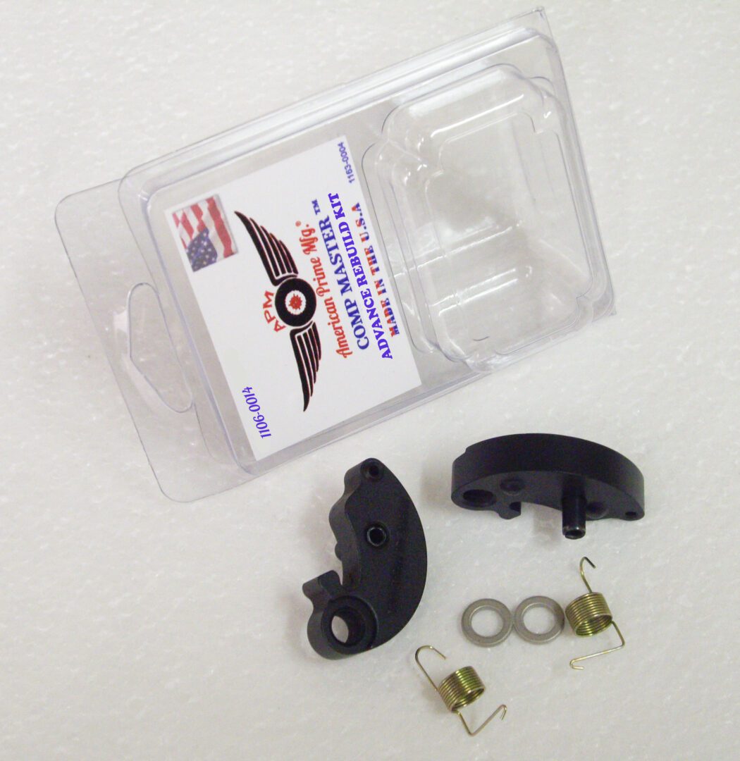 A pair of black motorcycle brake pads in plastic case.