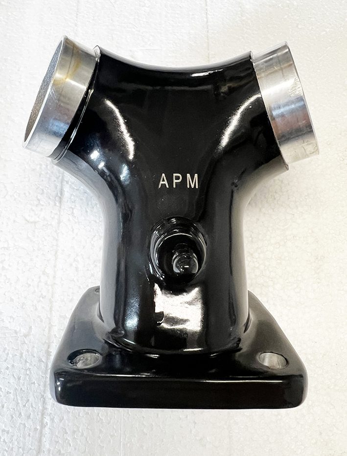 A black and silver pole with the letters apm on it.