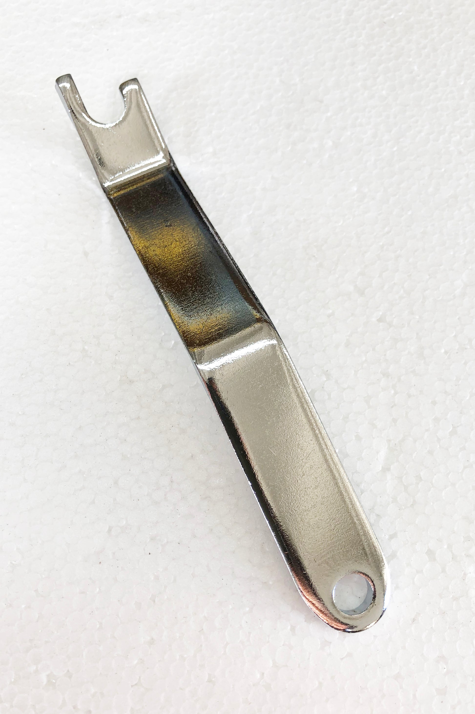 A metal object that is on the ground.