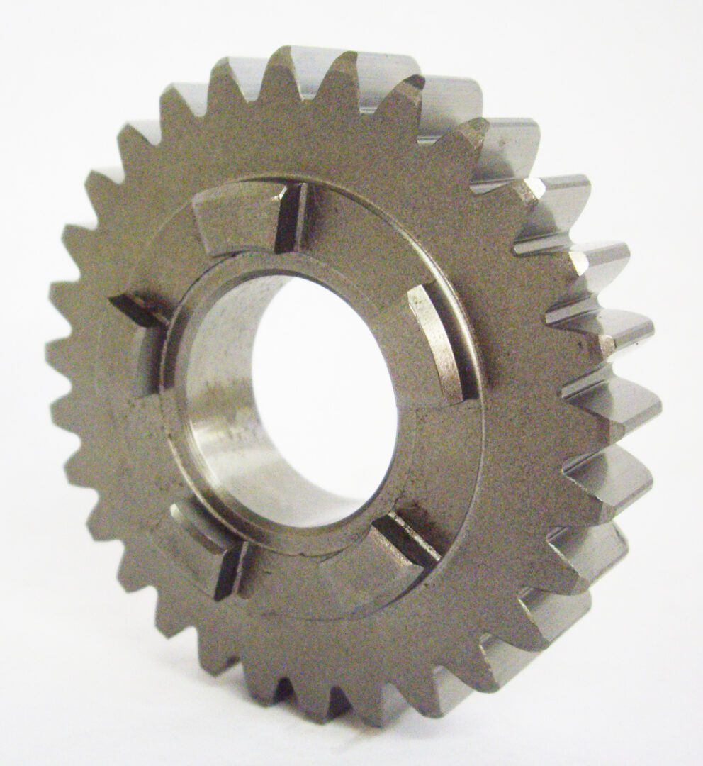A close up of a gear on a white background