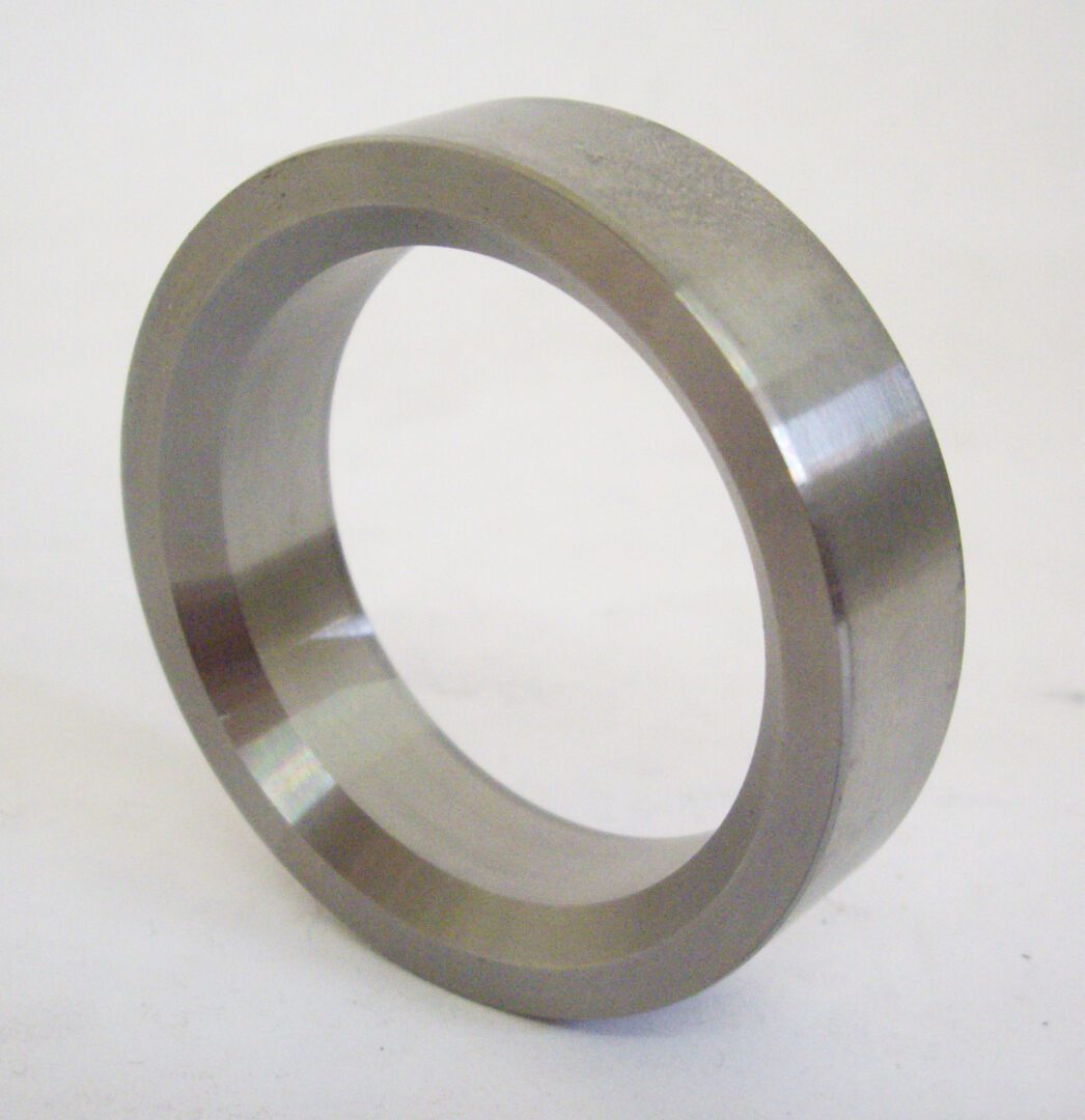 A metal ring that is sitting on the ground.