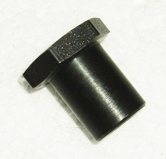 A black plastic cap with a metal ring on it.
