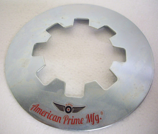 A metal disc with the words " american prime mfg."