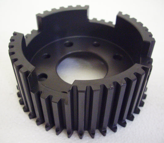 A black plastic gear with a hole in it.