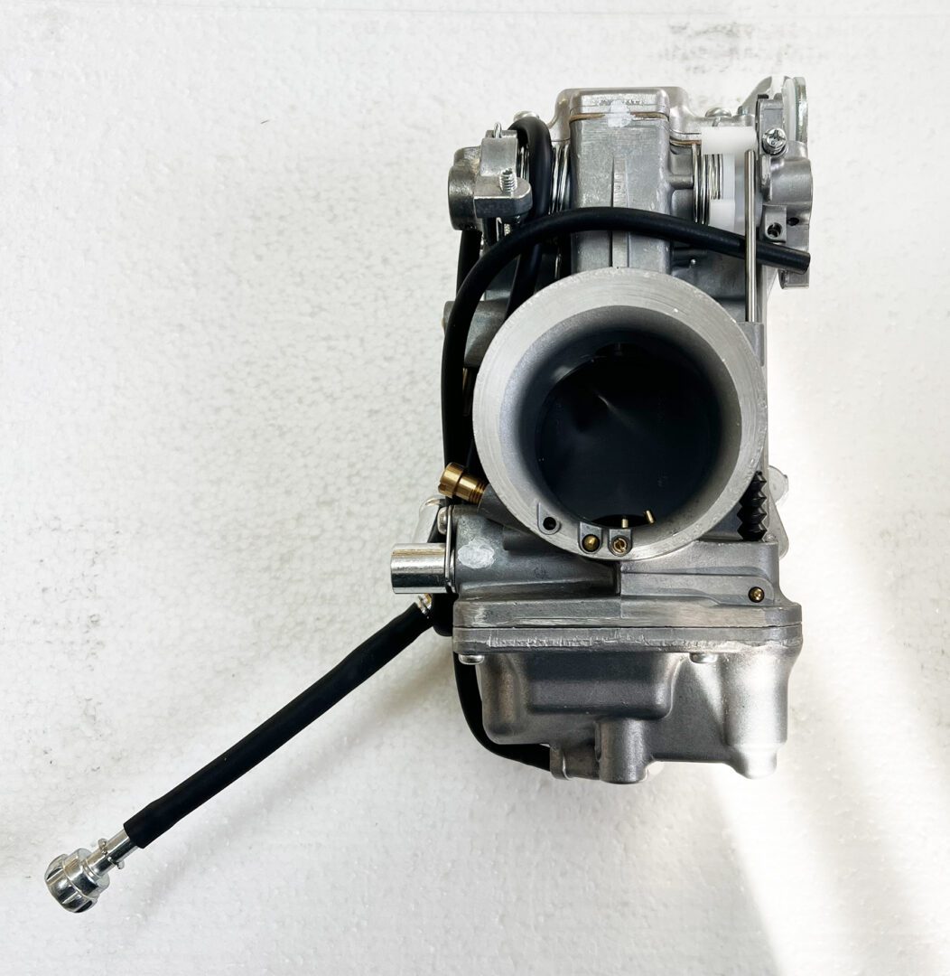 A carburetor is attached to the wall.