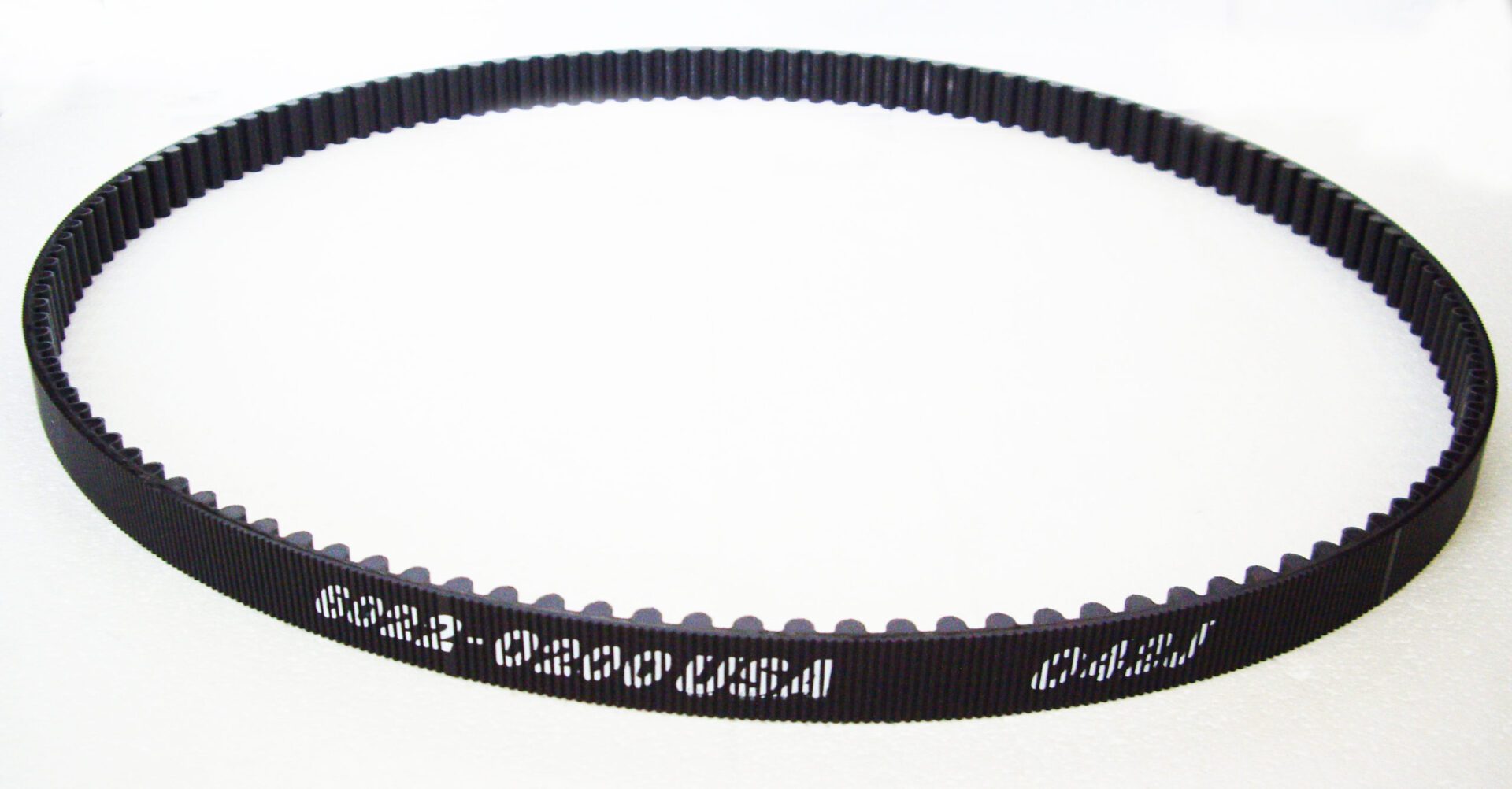 A black belt with the words " 0 2 2-0 3 0 0 5 6 8 " written on it.